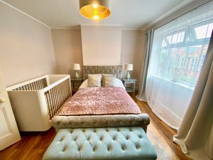 Bedroom One- click for photo gallery